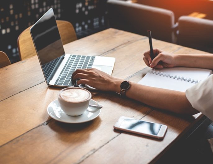 close up of business woman working with documents and laptop in office. business and lifestyles concept. entrepreneur and freelance theme.