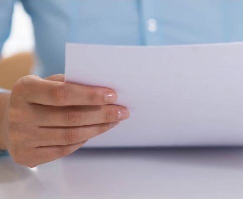 closeup of person reading document