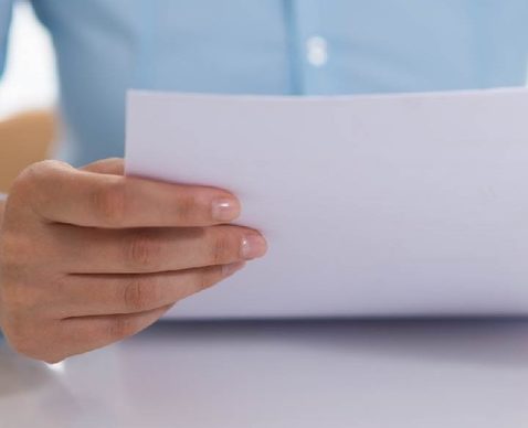 closeup of person reading document