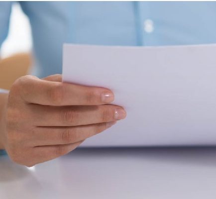closeup of person reading document