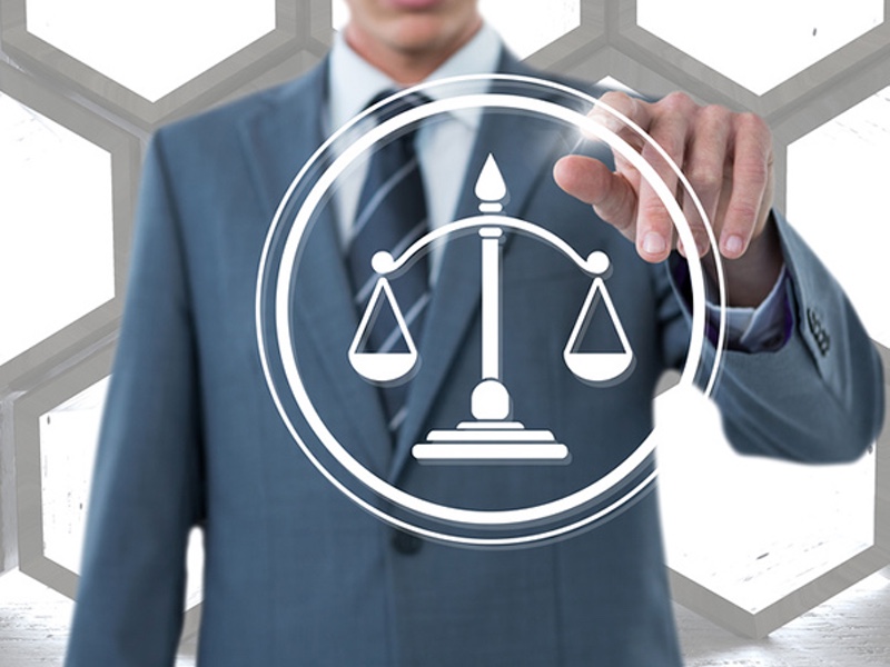 businessman pointing at justice icon